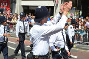 Policeman claps in London street