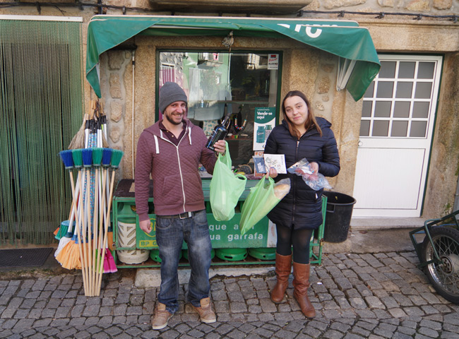 Katarina and Matt outside the shop with their booty