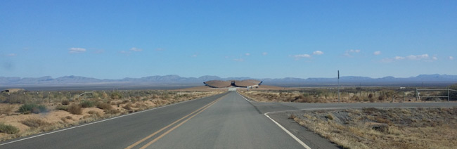 The road leading to the distant spaceport