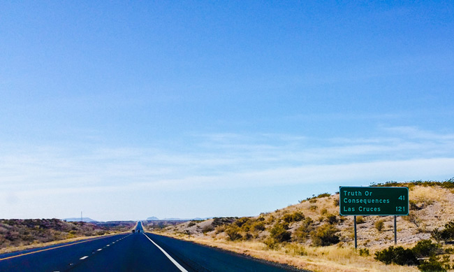 Road sign indicating distance to Truth or Consequences