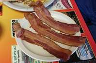 Three slices of American bacon