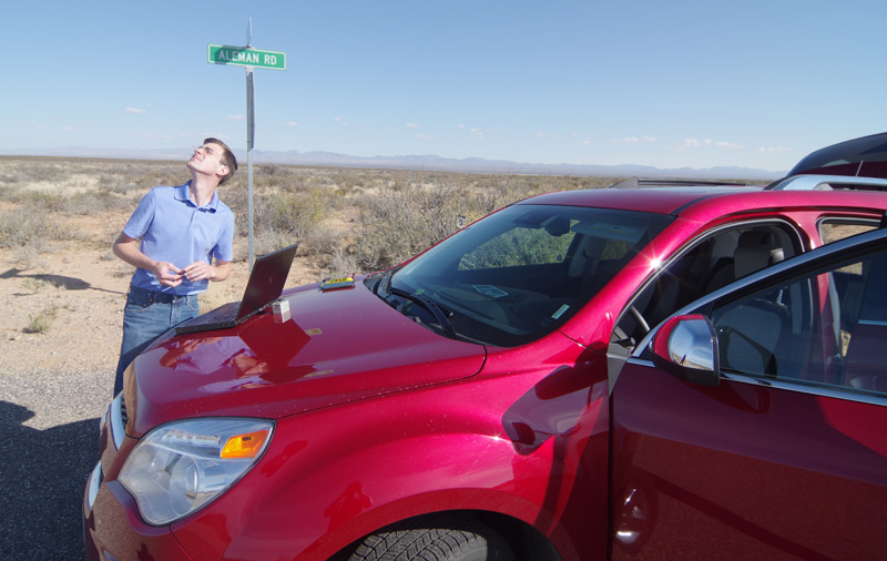 David outside the car in the desert during our trip to Spaceport America