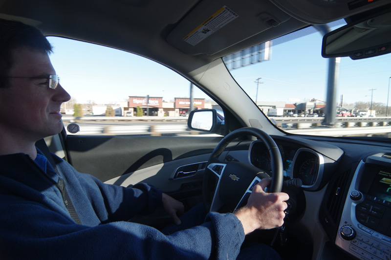 David at the wheel of the car during our trip