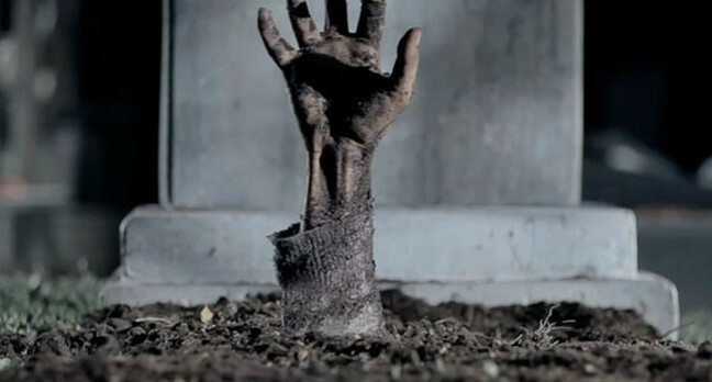 Zombie rising from the grave