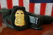 FBI badge and gun