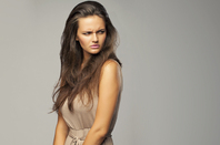 Pretty woman looks miffed. Copyright: Danil Nevsky via Shutterstock http://www.shutterstock.com/pic.mhtml?id=149618984&amp;src=id