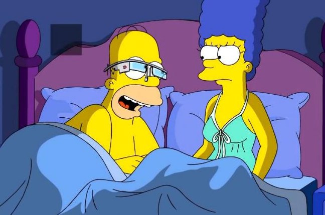 Homer Simpson wearing a Glass headset to bed