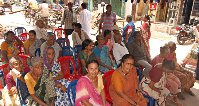 Poor people in India queue for a political party-sponsored medical check. Pic: Welfare Party of India