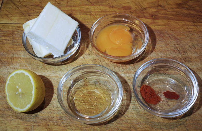 The ingredients required to make hollandaise sauce