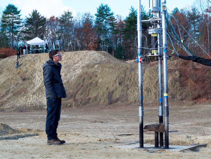 Jeremy Pedro eyes a motor on a static test rig