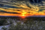 Sunset over the Texan desert. Photo by ArchBob, licensed under cc0 public domain