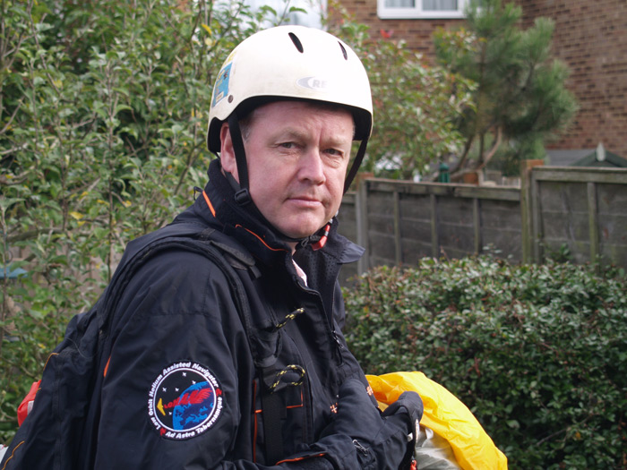 Neil Barnes in his flight suit with LOHAN patch