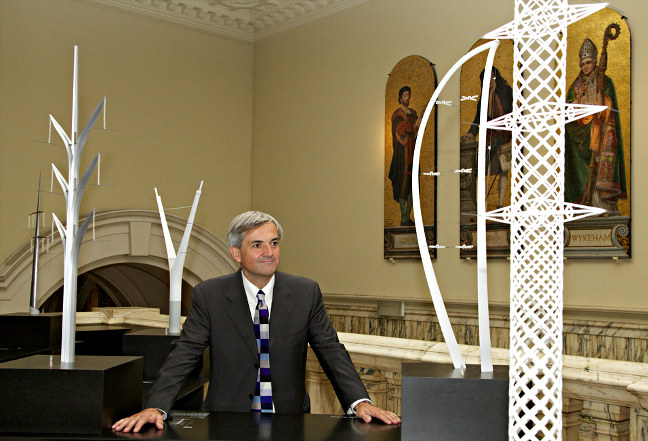 Chris Huhne, ex-Energy Secretary, with pylon designs. Zoe Norfolk/Dept of Energy