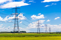 Traditional lattice pylons in the UK countryside