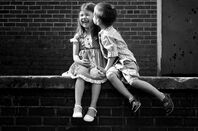 Kids on wall. Pic: US Army/Capt Emily Skolozynski