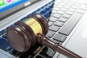 gavel on keyboard