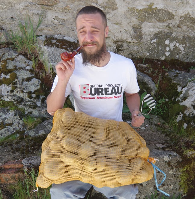 Matthew with an enormous bag of spuds