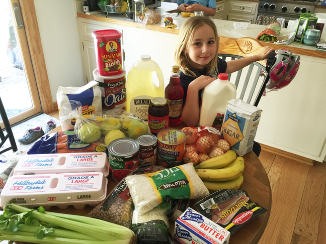 Richard's daughter Zinta and the family's food stockpile