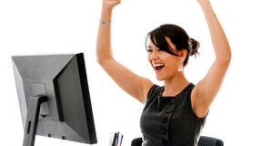 happy_woman_at_desk