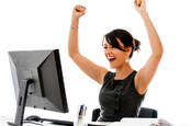 happy_woman_at_desk