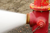 gushing fire hydrant, photo via Shutterstock
