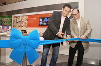 Snipping the ribbon to open a new Microsoft Authorized Reseller