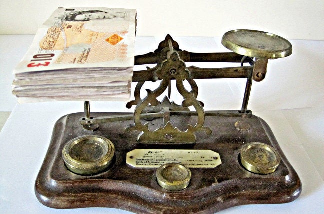 Cash on scales. Pic: Images M oney, Flickr