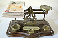 Cash on scales. Pic: Images Money, Flickr