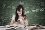 http://www.shutterstock.com/pic-206007979/stock-photo-female-student-using-mobile-phone-in-classroom.html?src=QwV6NI1PxgBasokGhlmPQA-1-27