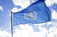 United nations flag by https://www.flickr.com/photos/sanjit/ cc 2.0 attribution https://creativecommons.org/licenses/by/2.0/
