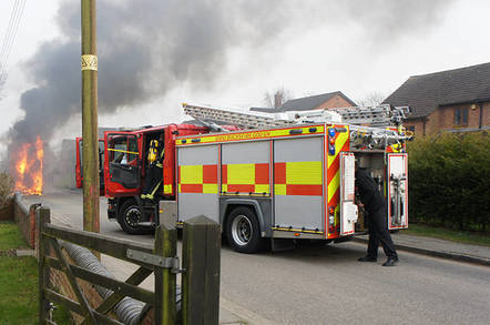 A bus on fire in Whaddon