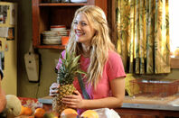 Drew Barrymore holding a pineapple in 50 First Dates