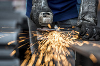 Angle grinder image via Shutterstock