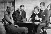 A family listening to a crystal radio set