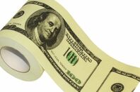 Toilet roll printed with fake US $100 bills