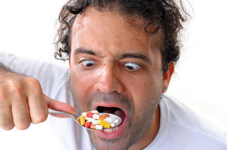 Takign medicine, image via Shutterstock