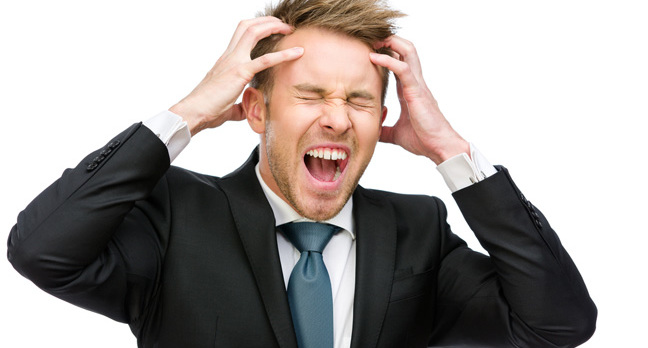 Shounting man in suit image via Shutterstock