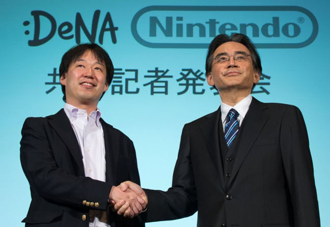 DeNA CEO Isao Moriyasu (left) shakes on the deal with Nintendo President Satoru Iwata (right) back in March 2015.