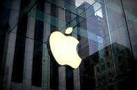 Apple logo on glass fronted building. Licensed under cc0 / editorial use only