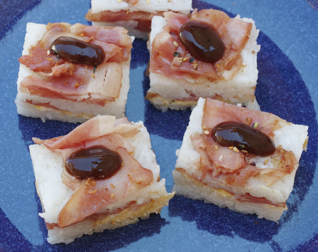 A plate loaded with the finsihed oshizushi