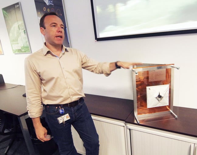 Emmet Fletcher demonstrates the damage a 6mm piece of aluminium can to to a spacecraft's skin