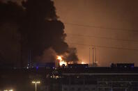 Smoke and fire are seen after an explosion in the Binhai New Area in north China's Tianjin Municipality on Aug. 13, 2015. An explosion rocked the Binhai New Area in north China's Tianjin Municipality at around 11:30 p.m. Wednesday. The cause and casualties are not immediately known. (Xinhua/Yue Yuewei)
