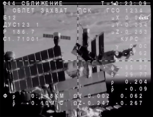 View from Soyuz showing other vehicles parked at the ISS. Pic NASA TV