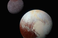 Pluto and Charon. Credits: NASA/JHUAPL/SwRI
