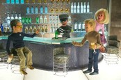 The puppets from Team America: World Police gather at a bar for drinks. 