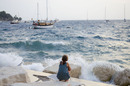 Boats storm girl photo via Nikolina Mrakovic Shutterstock.com
