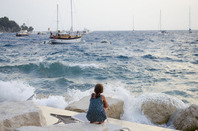 Boats storm girl photo via Nikolina Mrakovic Shutterstock.com