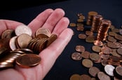 A handful of euro 1 cent coins