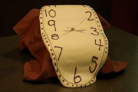 Melted chocolate clock by Emily McCracken, CC2.0 license