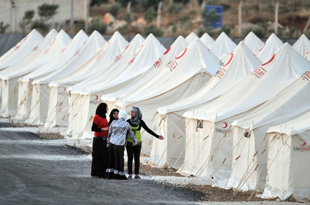Syrian refugees, photo by Thomas Koch for Shutterstock.com